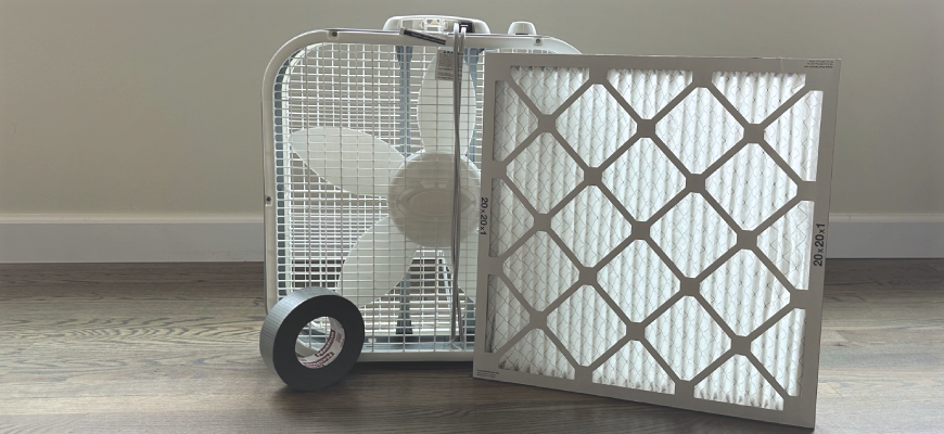 Box fan, duct tape and an air filter used to make a DIY air cleaner