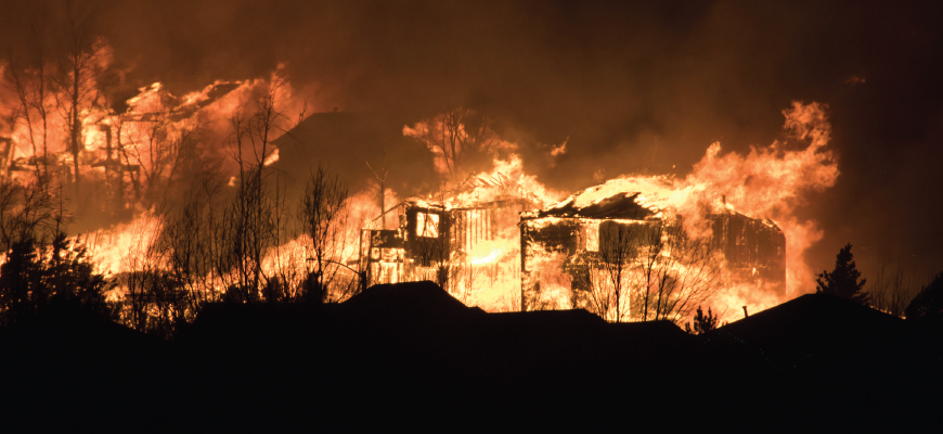 Homes burning in a WUI community